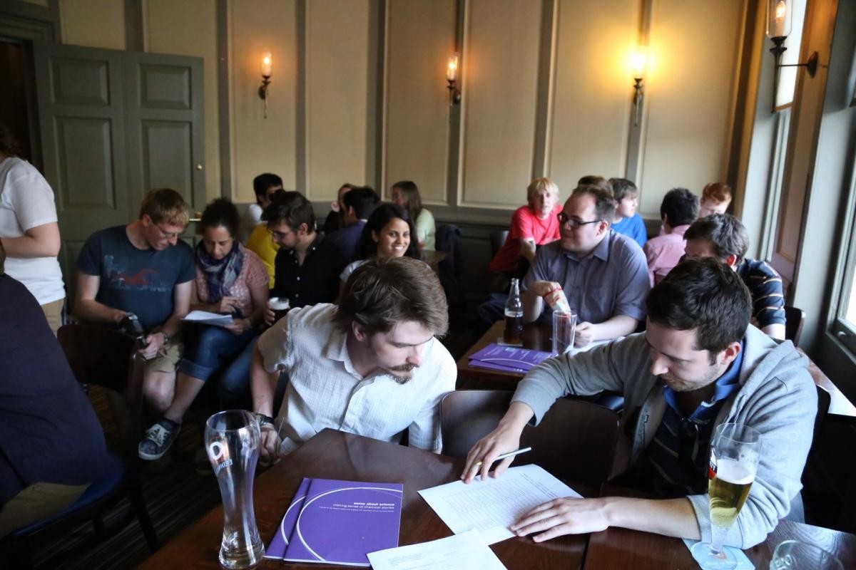 Attendees sitting down at a pub for 3Rs-related educational fun