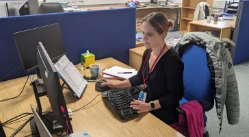 Selina Ballantyne sat at her desk